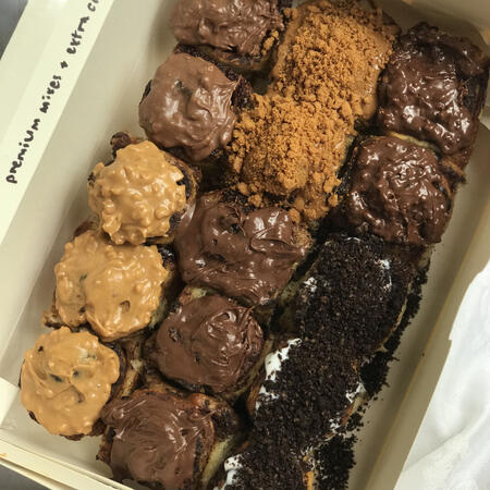 15pcs baby rolls with premium mixes toppings + extra cinnamon (RM33)